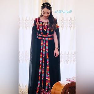 Hand embroidered Palestinian thobe.